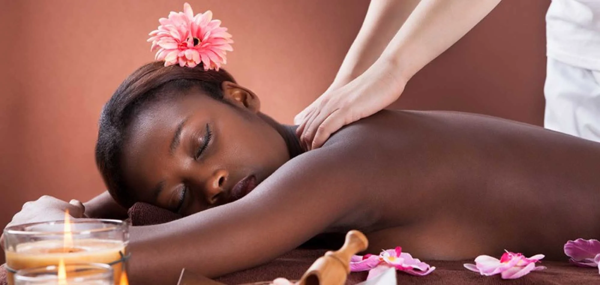 ACM Black-woman-laying-down-getting-a-massage